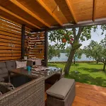 House Ive, House Beta - A Romantic Hideaway In An Olive Grove By The Sea, Fenced With Privacy, Swimming Pool, Jacuzzi And Playground, Pomer Holiday home *